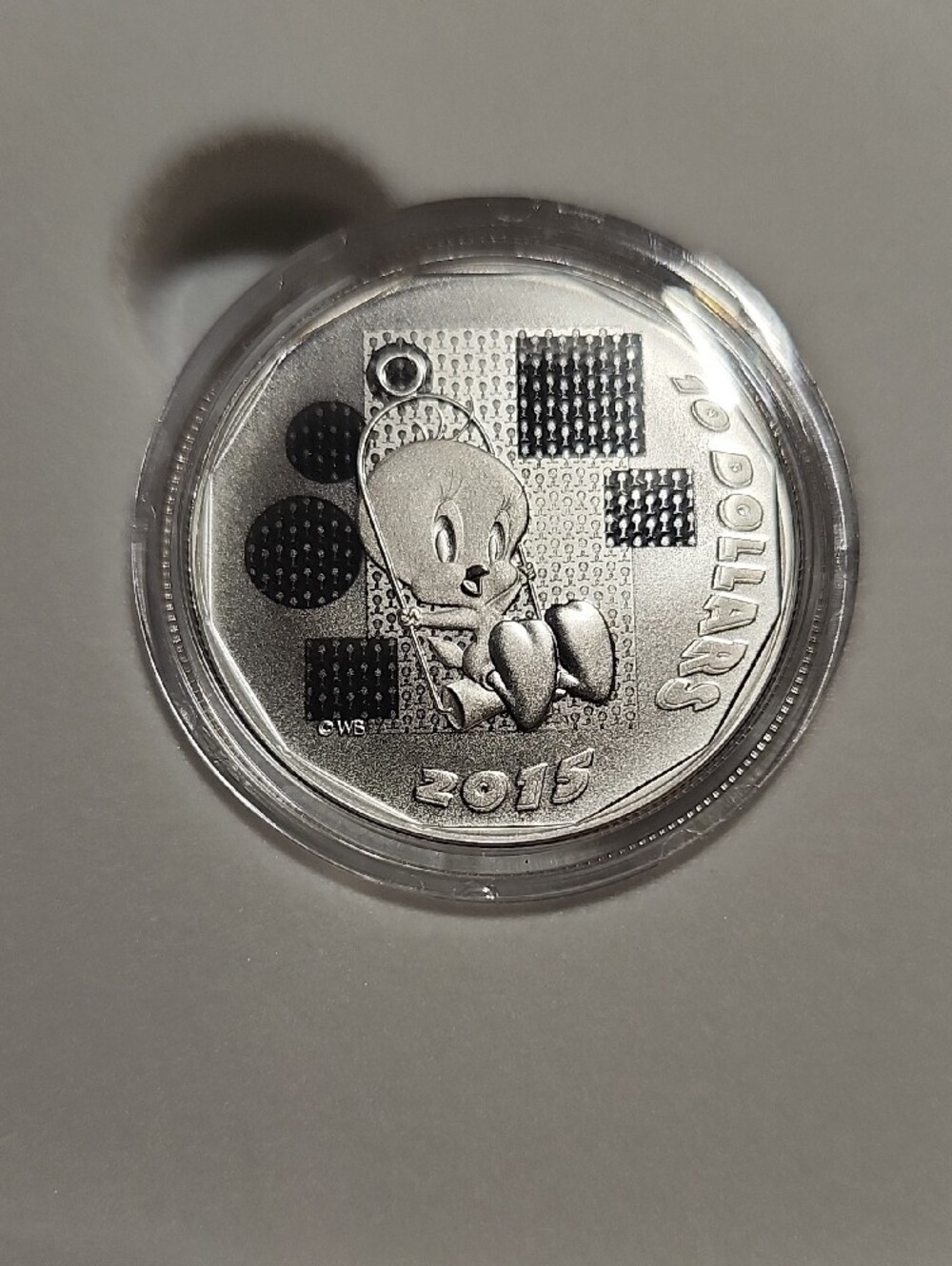 Warner Bros. Looney Tunes tweety silver coin.